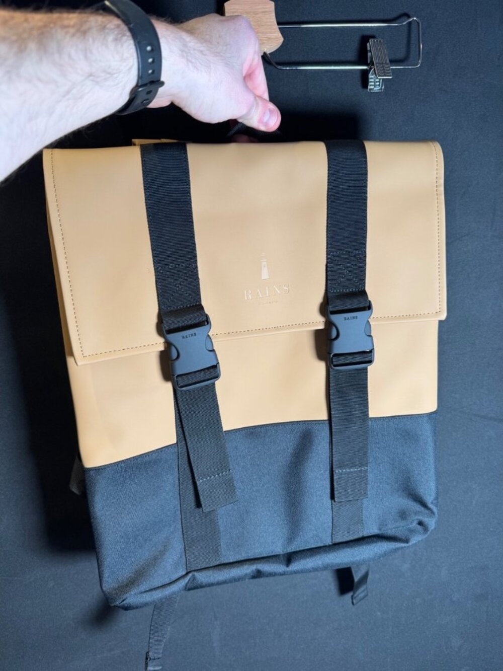 Rains tan and black Rolltop Backpack
